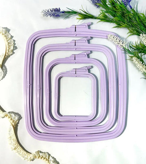 https://www.hobbyjobby.co.uk/cdn/shop/files/cross-stitch-square-hoop-purple-nurge-embroidery-hoop-hoops-hobbyjobby-1_512x577.jpg?v=1699489748